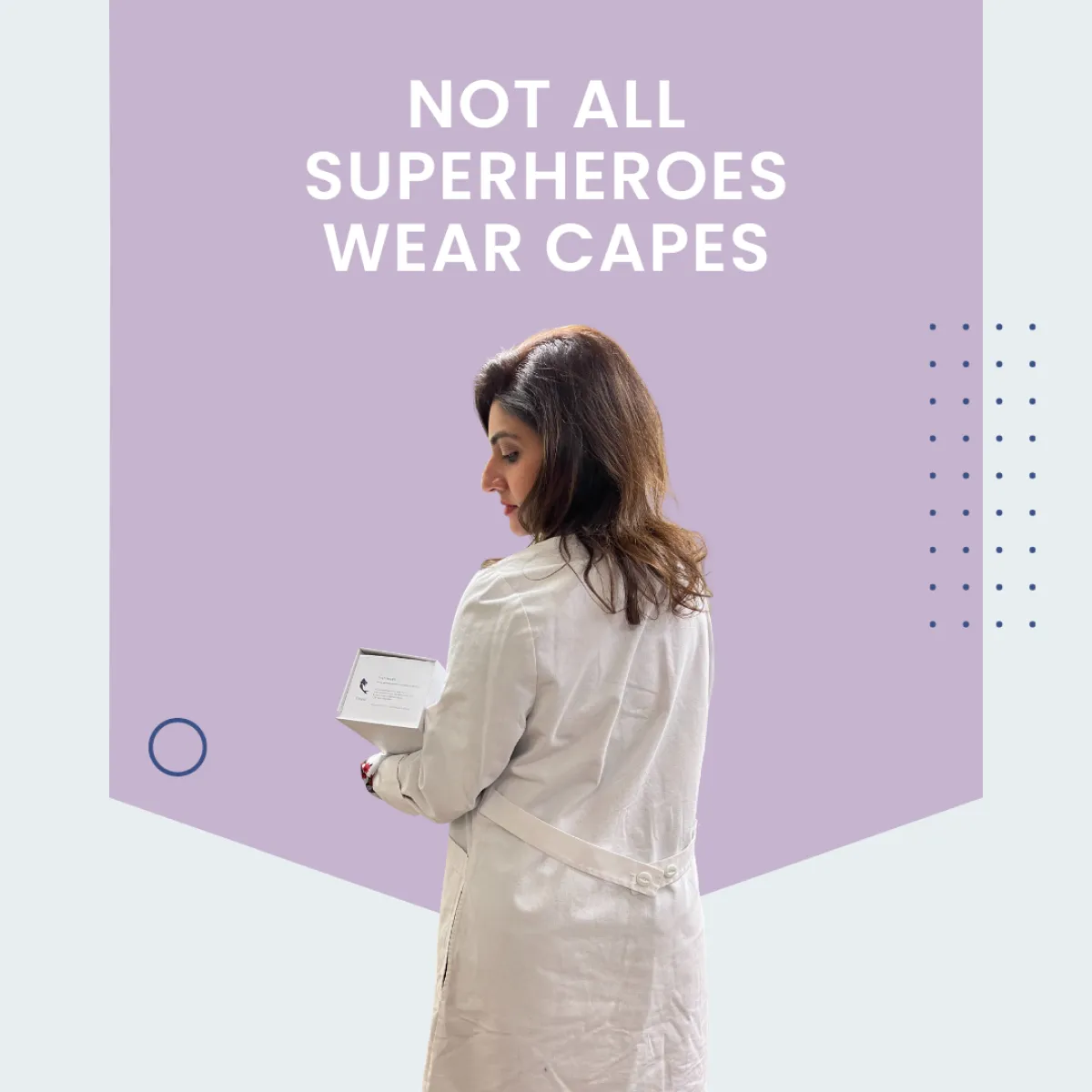 Woman in white coat holding a small box with text above saying 'Not all superheroes wear capes' on a purple background.